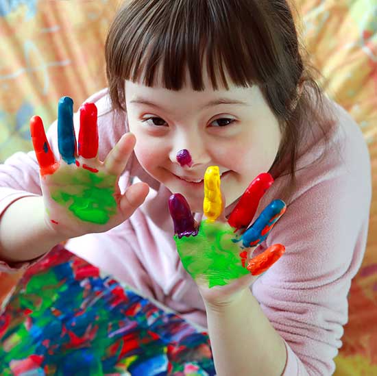 awfully cute girl with paint on her hands